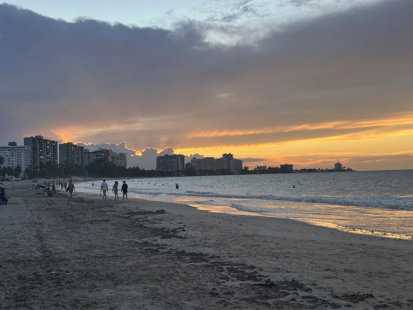Golden sunset across the water at Isla Verde