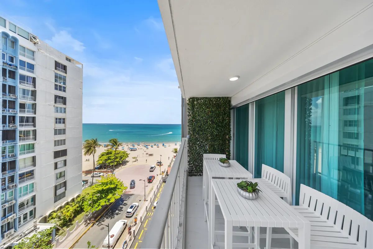 Isla Verde shoreline and turquoise Atlantic water beside Coastelle Suites