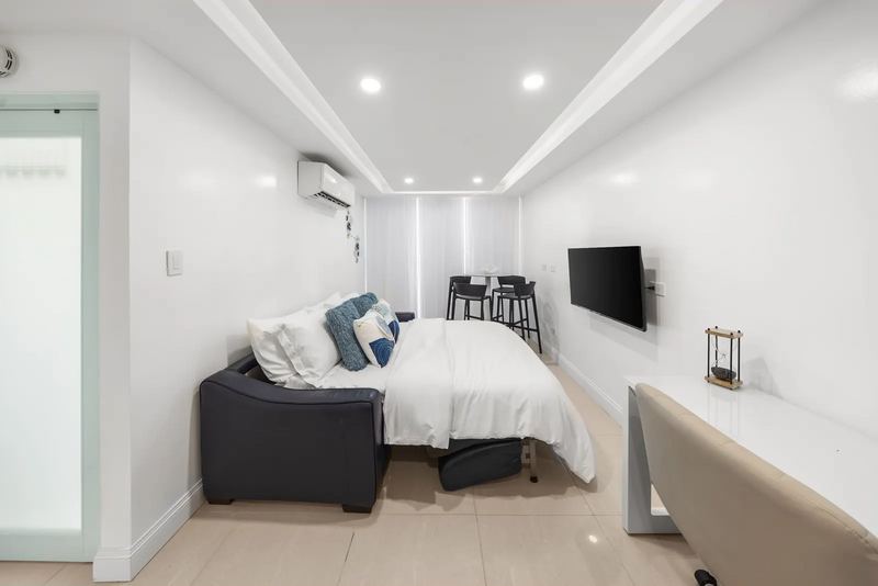 Maréa living area with sofa and desk