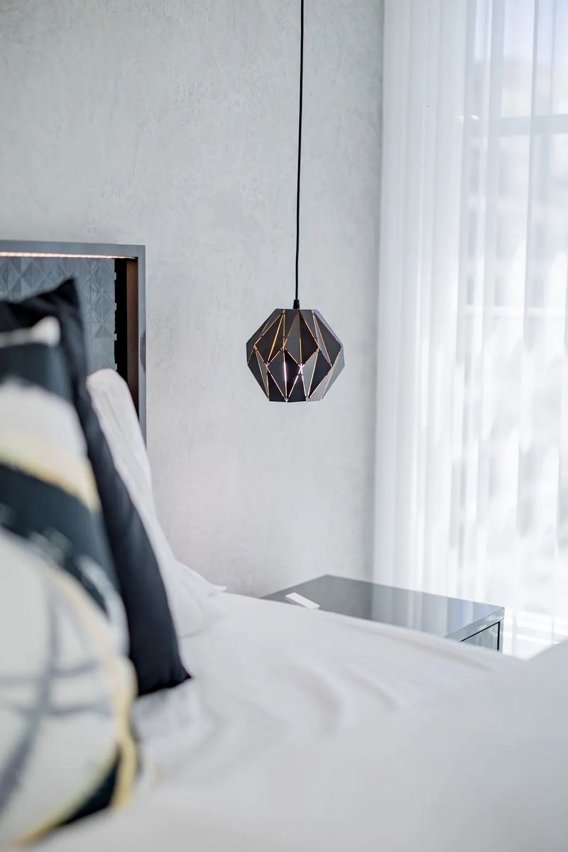Terra Noir king bed beside the window