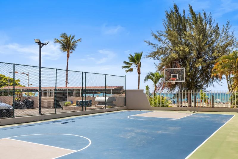 Outdoor basketball court beside the beach